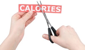 Cutting calories on white background